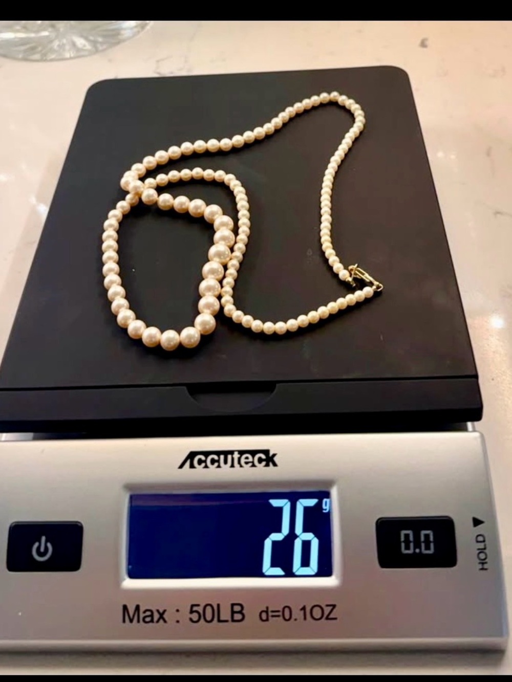 Vtg. Matinee Pearl Necklace. 14K gold clasp. 26” long. Weight: 26g
